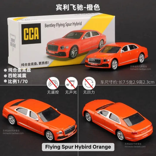 Orange model car with packaging and specifications on a dark background